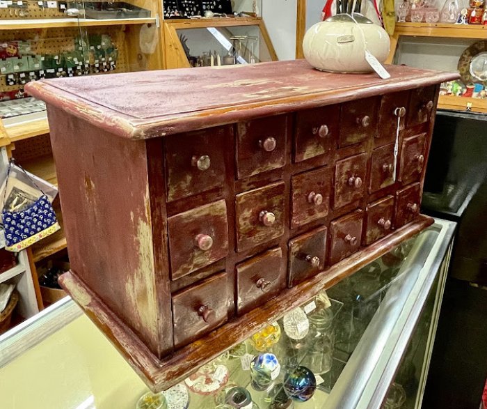 Red 18-drawer apothecary cabinet